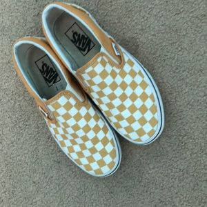 Checkered yellow vans.